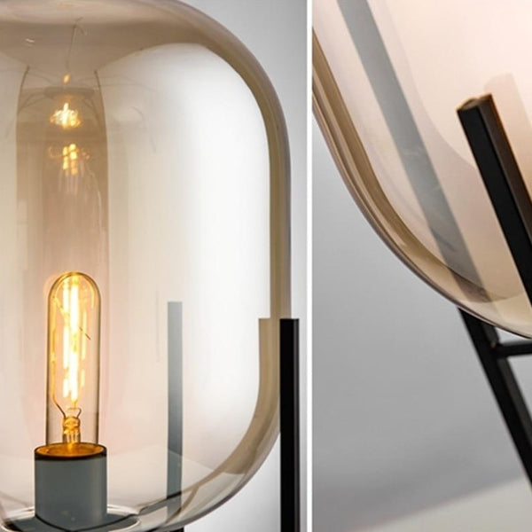 Lights of scandinavia - Fyr - Modern table/floor lighting with E27 fixture. Works just as good in the bedroom as in corridors, hallways or as spot lighting in a living area. Fun fact: "Fyr" means lighthouse in Swedish. Iron framework with two glass colors to choose from.