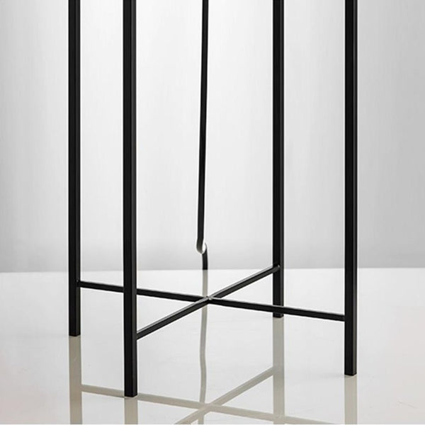 Lights of scandinavia - Fyr - Modern table/floor lighting with E27 fixture. Works just as good in the bedroom as in corridors, hallways or as spot lighting in a living area. Fun fact: "Fyr" means lighthouse in Swedish. Iron framework with two glass colors to choose from.